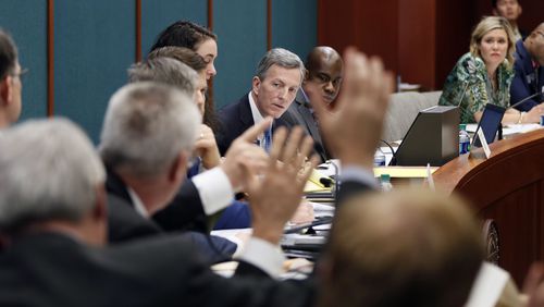 Senate Judiciary Chairman Jesse Stone counts votes during a hearing on a bill to prohibit convicted domestic abusers from possessing firearms. The bill passed the committee unanimously. Bob Andres, bandres@ajc.com