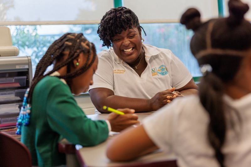 Atlanta Public Schools Superintendent Lisa Herring (center) visits Hope-Hill Elementary School on the first day of classes in Atlanta on Monday, Aug. 1, 2022. (Arvin Temkar / arvin.temkar@ajc.com)
