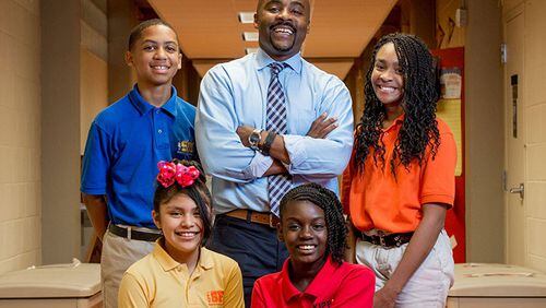 Jondré Pryor, shown with students at KIPP South Fulton Academy, is one of the longest-serving school leaders in the national KIPP network. (KIPP)