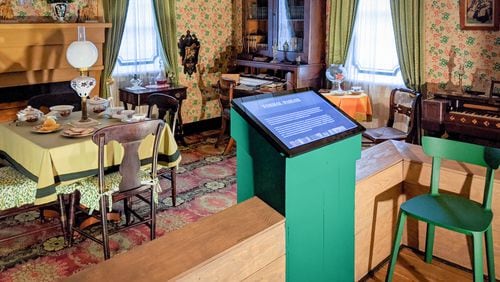 This room in the historic William Root House Museum in Marietta, Georgia, depicts life in the 1850s, including with a touchscreen tour. Cobb Landmarks