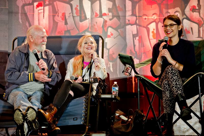 October 19, 2014 Atlanta - Scott Wilson (left), Emily Kinney and Lauren Cohan who play Herschel, Beth and Maggie on the Walking Dead, talk to fans at a panel during Walker Stalker Con in Atlanta on Sunday, October 19, 2014. For three days fans got the chance to immerse themselves in all things Walking Dead and zombies. JONATHAN PHILLIPS / SPECIAL