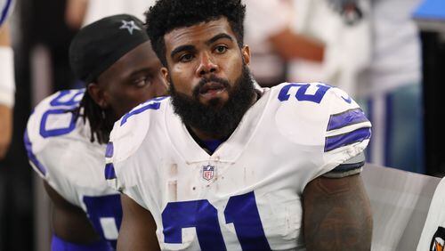 Dallas Cowboys running back Ezekiel Elliott (21) on the bench during the second half against the Oakland Raiders at AT&T Stadium.