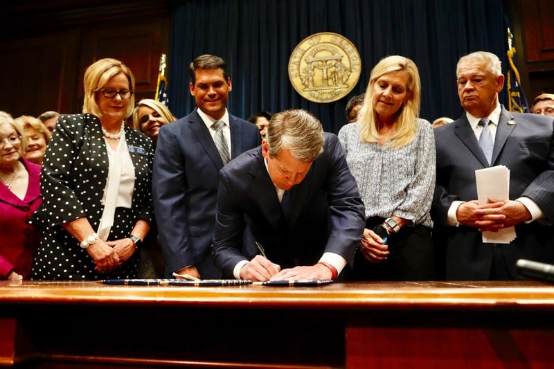 Gov. Brian Kemp signs legislation in 2019 that outlaws most abortions at about six weeks, making it one of the nation's toughest laws regulating the procedure. A federal judge put the law on hold while waiting for the U.S. Supreme Court to rule on a case from Mississippi that was the subject of a leaked opinion by Justice Samuel Alito indicating Roe v. Wade will be overturned. Bob Andres/bandres@ajc.com