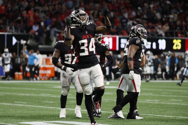 Falcons cornerback Darren Hall reacts at the end of regulation. The host Falcons defeated the Panthers 37-34 in overtime. (Miguel Martinez / miguel.martinezjimenez@ajc.com)