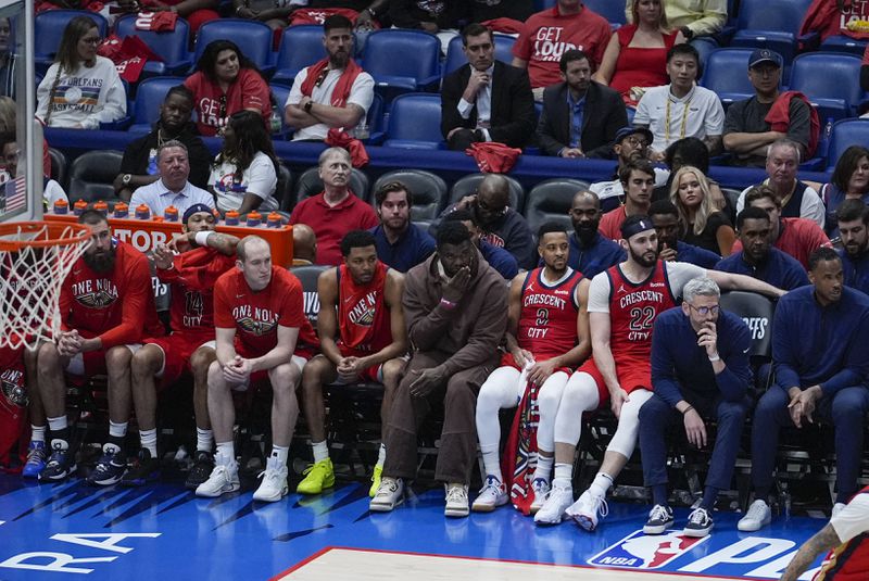 The New Orleans Pelicans bench watches late in the second half of Game 3 of an NBA basketball first-round playoff series against the Oklahoma City Thunder in New Orleans, Saturday, April 27, 2024. The Thunder won 106-85. (AP Photo/Gerald Herbert)