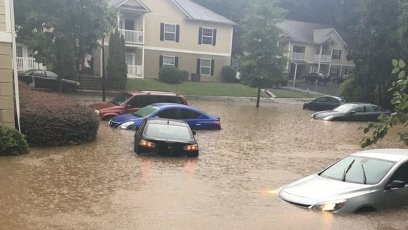 Apartments and cars were flooded Saturday evening when heavy rain caused flooding at a Clayton County apartment complex.