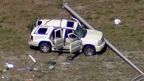 Eight people from Marietta, including six children, were injured in a two-vehicle crash in Florida, authorities said.