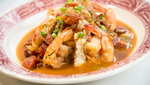 Shrimp and grits is served at Southern Bistro with andouille sausage, caramelized onions and tomato pan gravy. (Mia Yakel)