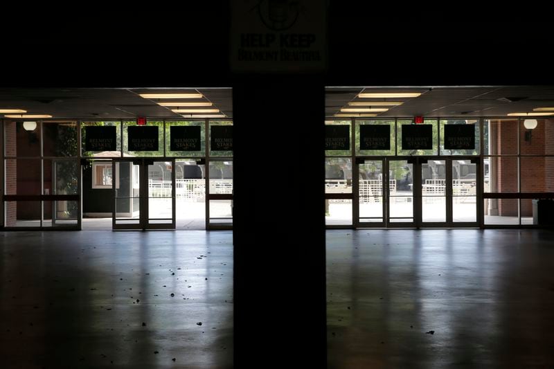 A normally full Belmont Park is empty before the 152nd running of the Belmont Stakes horse race in Elmont, N.Y., Saturday, June 20, 2020. (AP Photo/Seth Wenig)