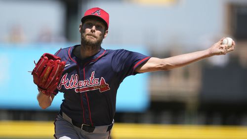 Atlanta Braves starting pitcher Chris Sale throws during the first inning of a spring training baseball game against the Pittsburgh Pirates Tuesday, Feb. 27, 2024, in Bradenton, Fla. (AP Photo/Charlie Neibergall)