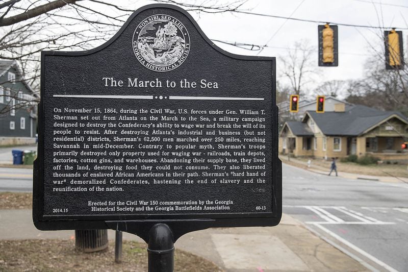 A historical marker commemorating Union Gen. William T. Sherman’s destructive march from Atlanta to Savannah is displayed at the intersection of North Avenue and Moreland Avenue in Atlanta. ALYSSA POINTER / ALYSSA.POINTER@AJC.COM