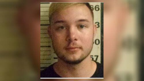 Grant Godfrey Hall, 21, was arrested in New York's Port Authority Bus Terminal with weapons after allegedly living out of his car for two weeks in the parking deck.