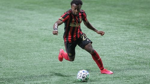 Atlanta United defender George Bello (21) drives the ball down field during the second half of a MLS game against the New York Red Bulls at Mercedes-Benz Stadium on Saturday, Oct. 10, 2020, in Atlanta. Branden Camp/For the Atlanta Journal-Constitution