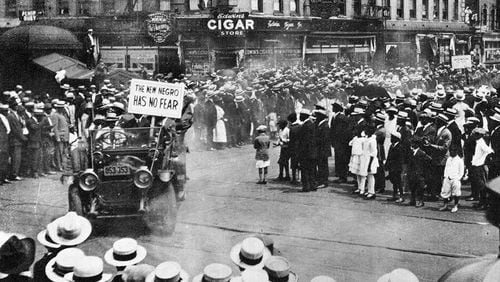 A parade by the Universal Negro Improvement Association works its way through Harlem in 1920, and features a slogan about the "New Negro." In the early 20th century, the Harlem Renassaince embraced and promoted a new wave of advocacy, culture and pride, which some called "The New Negro Movement." (NY Public Library Public Colletions)