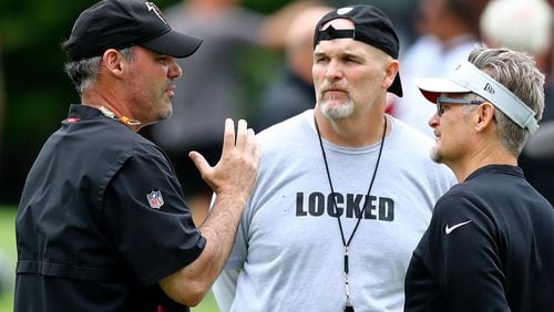 Falcons coach Dan Quinn sports a new team motto "Locked" on his shirt during minicamp on Wednesday, June 12, 2019, in Flowery Branch.  Curtis Compton/ccompton@ajc.com