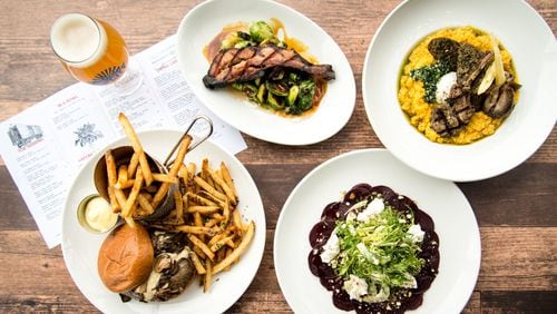 BoxCar (clockwise from bottom left) The Big Bleu Bison Burger, Bacon and Brussels, Lamb and Pumpkin Polenta, and Roasted Beet Carpaccio. Photo credit- Mia Yakel.