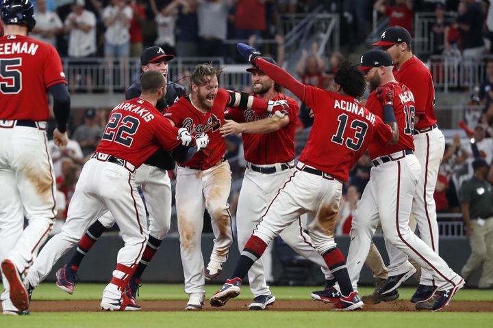 Photos: Braves celebrate after outlasting the Nationals