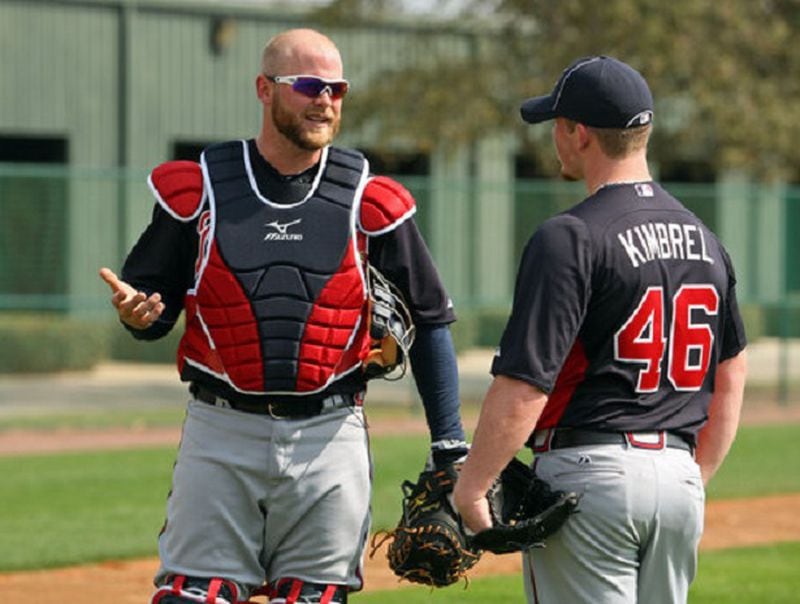 Feb. 23, 2012- LAKE BUENA VISTA, FL: Atlanta Braves catcher Brian McCann, left, talks with closer Craig Kimbrel after Kimbrel pitched to McCann during the fourth day of pitchers and catchers workouts at Champion Stadium in the ESPN Wide World of Sports Complex Thursday morning in Lake Buena Vista, Fl., Feb. 23, 2012. Jason Getz jgetz@ajc.com One guy just left. How long will the other be here? (Jason Getz/AJC)