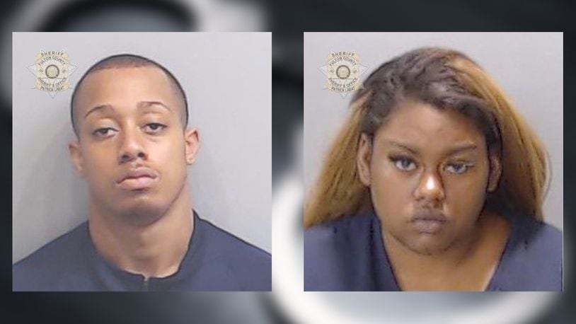 Daniel Wright (left) and T'Lani Robinson were each charged with murder related to the shooting death of 20-year-old Daniel Johnson near downtown Atlanta, police said.