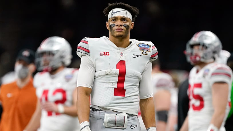 Ohio State quarterback Justin Fields goes No. 11 in the NFL draft to Chicago Bears. (AP Photo/John Bazemore, File)