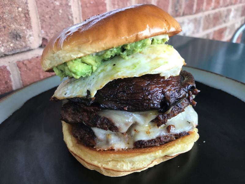 The Green Eggs & Lamb burger at Chicken & The Egg features a double stack blended burger made from Angus beef and Portobello, cremini and maitake mushrooms. Photo by Ligaya Figueras