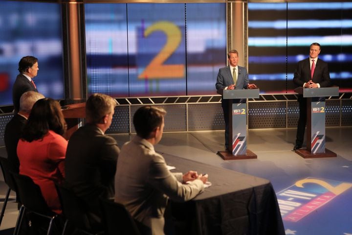 Four panelists, including Greg Bluestein of The Atlanta Journal-Constitution, and a moderator participated in the first debate of the GOP Republican primary for governor between Gov, Brian Kemp and former U.S. Sen. David Perdue at the WSB-TV studios in Atlanta on Sunday, April 24, 2022. (Photo: Miguel Martinez/miguel.martinezjimenez@ajc.com)
