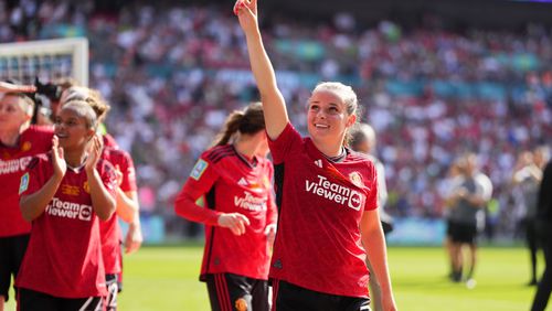 Manchester United's Ella Toone celebrates at the end of the Women's FA Cup final soccer match between Manchester United and Tottenham Hotspur at Wembley Stadium in London, Sunday, May 12, 2024. Manchester United won 4-0. (AP Photo/Kirsty Wigglesworth)
