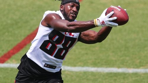 Falcons rookie wide receiver Frank Darby (out of Arizona State) catches a pass during organize team activities (OTAs) Tuesday, May 25, 2021, at the team training facility in Flowery Branch. (Curtis Compton / Curtis.Compton@ajc.com)