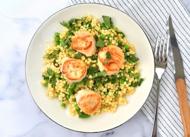 Seared Scallops with Minty Peas and Couscous. 
Chris Hunt for The Atlanta Journal-Constitution