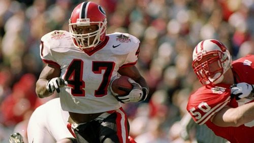 Georgia running back Robert Edwards moves the ball during the 1998 Outback Bowl against the Wisconsin Badgers at Houlihan's Stadium in Tampa, Fla. Georgia won, 33-6.