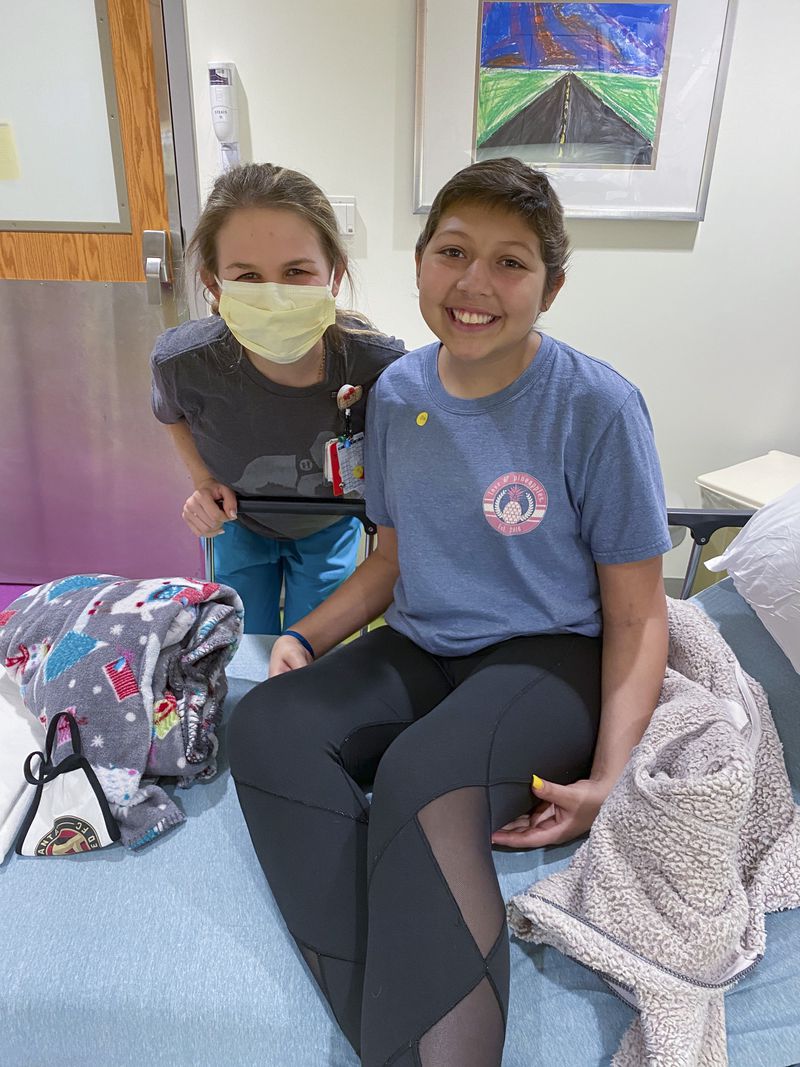 Amelia Ballard with Dani Cuevas, who is 15. Dani said Ballard has been an enormous source of support. (Courtesy of Children’s Healthcare of Atlanta)