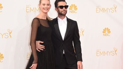 LOS ANGELES, CA - AUGUST 25: Singer Adam Levine (R) and model Behati Prinsloo attend the 66th Annual Primetime Emmy Awards held at Nokia Theatre L.A. Live on August 25, 2014 in Los Angeles, California. (Photo by Jason Merritt/Getty Images)