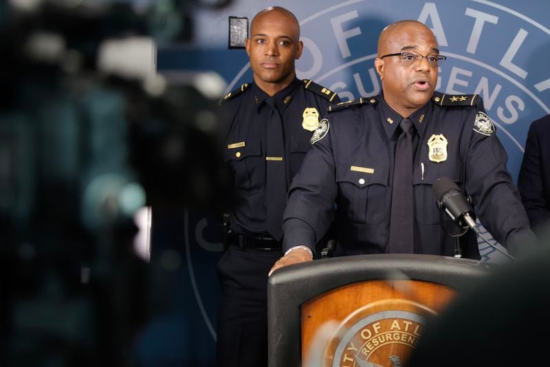(Left to right) Atlanta Police Capt. Ralph Woolfolk and Deputy Chief Charles Hampton hold a press conference to discuss the city’s plans to handle gang and gun violence this summer on Thursday June 22, 2023. (Natrice Miller/natrice.miller@ajc.com)