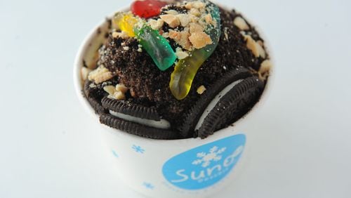 Suno shaved ice desserts in decatur on Sunday July 24, 2016. The Dirt o’ Oreo- gummy worm, chocolate syrup, oreo crumbs, crushed nuts & Oreo cookie. (BECKY STEIN PHOTOGRAPHY)
