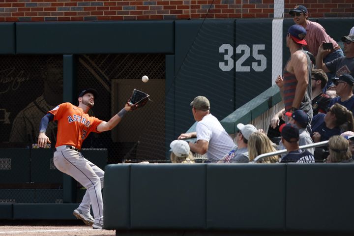 Astros right fielder Kyle Tucker catches a fly from Braves' Matt Olson during the eighth inning at Truist Park on Sunday, April 23, 2023.
Miguel Martinez / miguel.martinezjimenez@ajc.com 