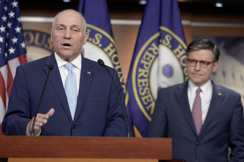 Majority Leader Steve Scalise, R-La., speaks as House Speaker Mike Johnson, R-La., listens during a news conference on Capitol Hill Wednesday, April 10, 2024, in Washington. (AP Photo/Mariam Zuhaib)
