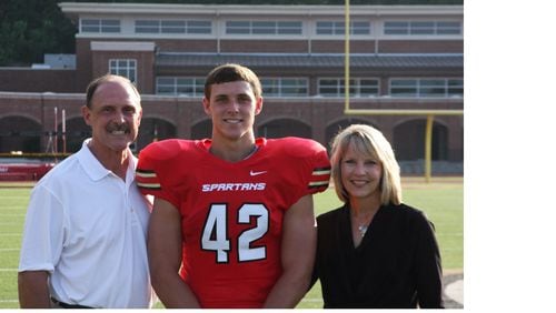 Georgia Tech freshman linebacker Tyler Cooksey with his father Tom and mother Cindy. (Courtesy of Cooksey family)