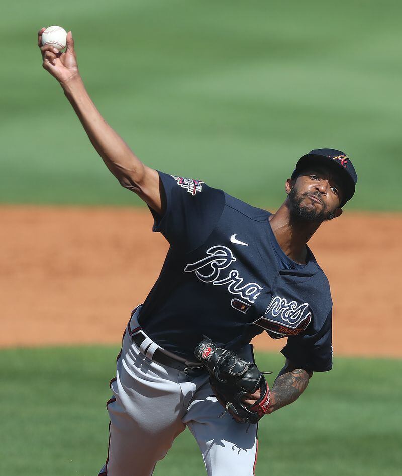 Atlanta Braves reliever Carl Edwards Jr. delivers a pitch against the Tampa Bay Rays during the 4th inning Sunday, Feb. 28, 2021, at Charlotte Sports Park in Port Charlotte, Fla. (Curtis Compton / Curtis.Compton@ajc.com)