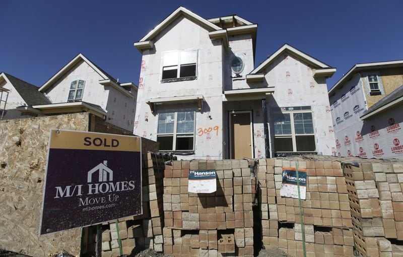 Prices for homes continues to rise with lower-priced homes in short supply. The price of land in metro Atlanta gives builders few incentives to build those starter houses. (AP Photo/LM Otero, File)
