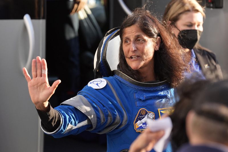 NASA astronaut Suni Williams waves to well wishers as she leaves the Operations and Checkout building before heading to Space Launch Complex 41 to board the Boeing's Starliner capsule atop an Atlas V rocket for a mission to the International Space Station at the Cape Canaveral Space Force Station, Monday, May 6, 2024, in Cape Canaveral, Fla. (AP Photo/John Raoux)