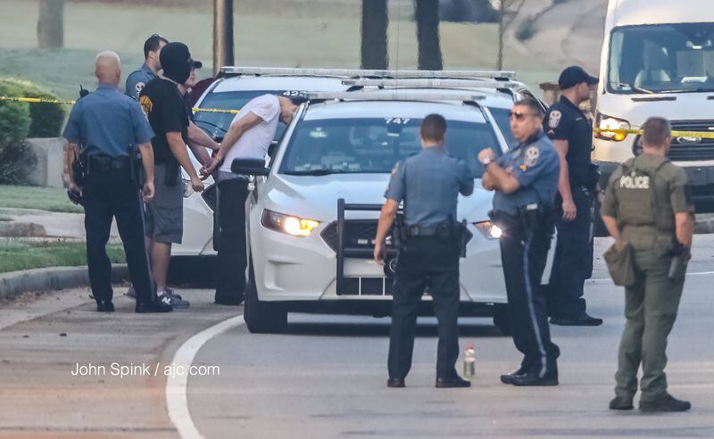 A woman was shot multiple times after shooting at a Gwinnett County SWAT officer Thursday, police said. (Credit: JOHN SPINK / JSPINK@AJC.COM)