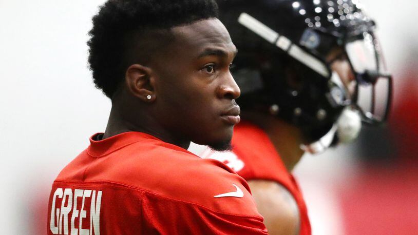 Injured Atlanta Falcons seventh round draft pick running back Marcus Green, who has a hamstring, watches over rookie minicamp practice Saturday, May 11, 2019, in Flowery Branch.
