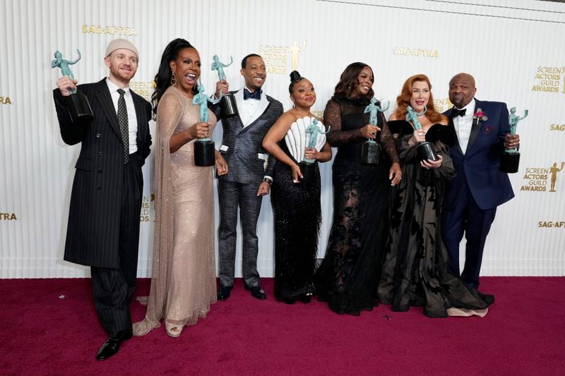 Chris Perfetti, from left, Sheryl Lee Ralph, Tyler James Williams, Quinta Brunson, Janelle James, Lisa Ann Walter, and Stanford Davis, winners of the award for outstanding performance by an ensemble in a comedy series for "Abbott Elementary," pose in the press room at the 29th annual Screen Actors Guild Awards on Sunday, Feb. 26, 2023, at the Fairmont Century Plaza in Los Angeles. (Photo by Jordan Strauss/Invision/AP)