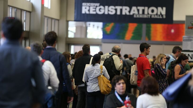 Crowds arrive for registration and panels of the first day of the South by Southwest Interactive festival on Friday, March 11, 2016.