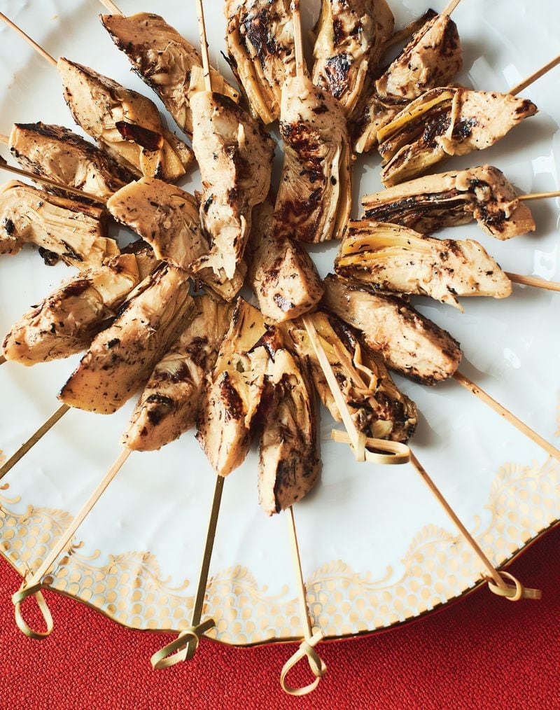 Artichoke Heart Skewers, from “Occasions to Celebrate: Cooking and Entertaining With Style” by Alex Hitz (Rizzoli, $45), absorb the flavor of two vinaigrettes. (Courtesy of Iain Bagwell)