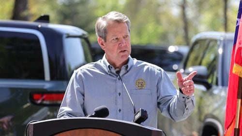 Gov. Brian Kemp speaks during a ceremony unveiling the first ever Rivian electric vehicle chargers at Tallulah Gorge State Park on Thursday, April 20, 2023. (Natrice Miller/ natrice.miller@ajc.com)
