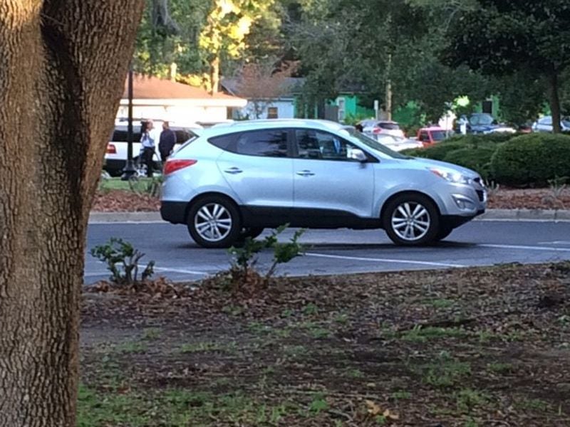 The SUV of Justin Ross Harris waits to be inspected by jurors in the parking lot of the Glynn County Courthouse, during Harris' murder trial in Brunswick, Ga., on Thursday, Oct.  27, 2016. Harris' defense team tried unsuccessfully to prevent the presentation of the SUV to the jury. Ross Harris declined to be present at the jury's viewing of what prosecutors call the crime scene. (Christian Boone / cboone@ajc.com)