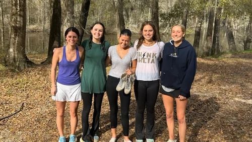 Five first-year students from the University of Georgia were on a road trip to Savannah on Friday, March 15, 2024 when they rescued a family whose vehicle was submerged in a Burke County creek south of Augusta. The students, some still in wet clothes after the encounter, are (from left to right) Kaitlyn Iannace, Clarke Jones, Jane McArdle, Molly McCollum and Eleanor Cart. COURTESY BURKE COUNTY SHERIFF'S OFFICE