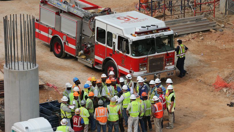 A man is being treated for a “severe head injury” after metal scaffolding fell on him at the construction site for the new Atlanta Falcons stadium, officials said.