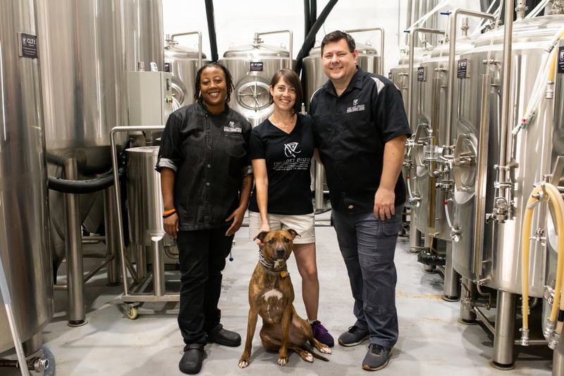 The Lost Druid team (from left to right) Executive Chef Chantel Mines, Owners Stacia Familo-Hopek Robert Hopek, and Roxy the brew dog.